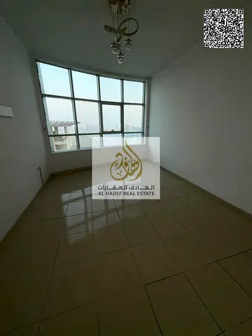 Annual Rent | 2 Bedrooms & Hall | Orient Towers Ajman - Creek View | AED 45,000