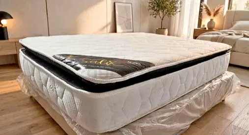 New King size mattress with pillow-top topper