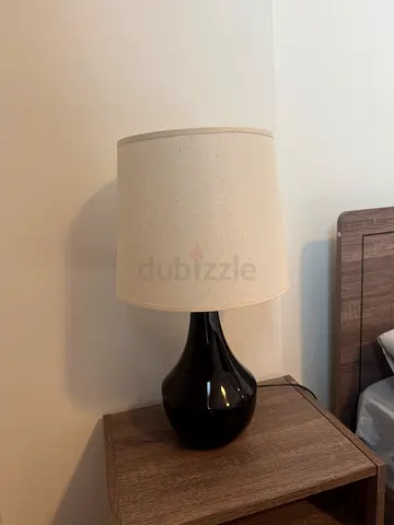Black ceramic table lamp with white fabric shade