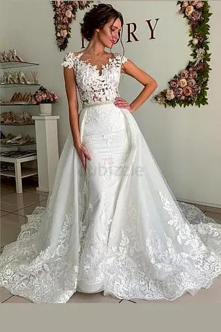 White lace wedding dress with detachable overskirt, size estimate L.. skirt detachable