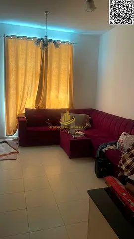 One-bedroom apartment with a living room and balcony in City Tower; includes parking and offers a return on investment; down payment of 225,000.
