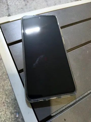 Used Samsung smartphone with clear case - good working condition