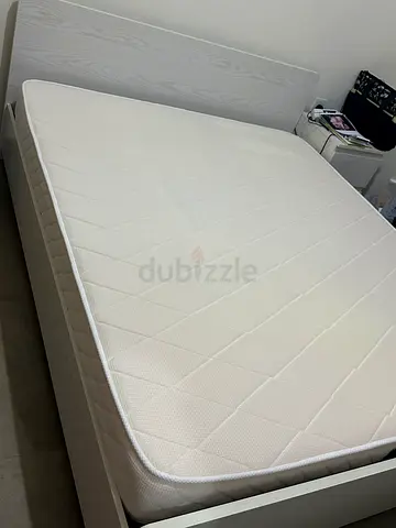 Wooden bed, 2 side tables, mattress