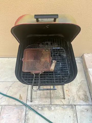 Used portable charcoal grill