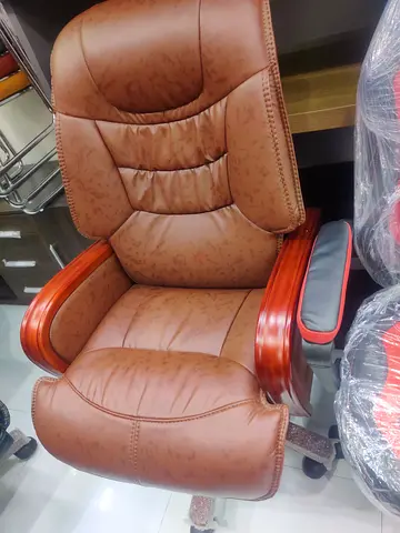 Brown leather office armchair with wooden arms new