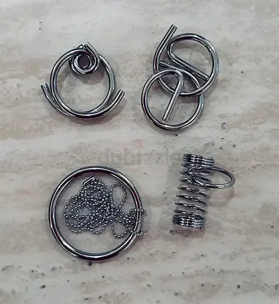 Set of 4 Metal Brain Teaser Puzzles
