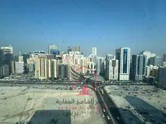 Free parking and open views! Spacious 2-bedroom apartment in Al Taawun with new finishing, central A