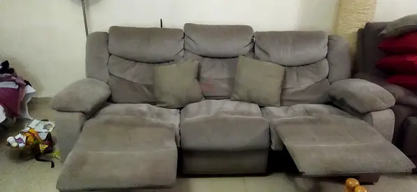 Three-seater reclining sofa for immediate sale.