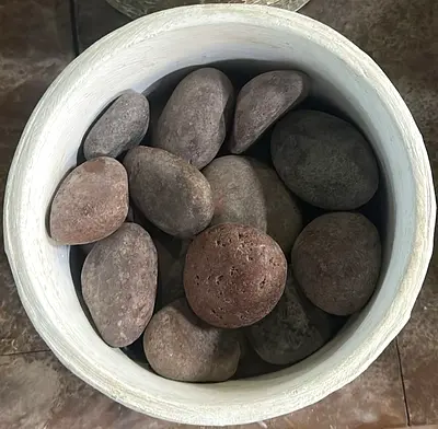 Decorative river stones in white planter - set of natural pebbles