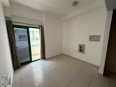 Studio for Annual Rent in Al Aamra – Smart Tower • Studio with Balcony • Separate Kitchen • 