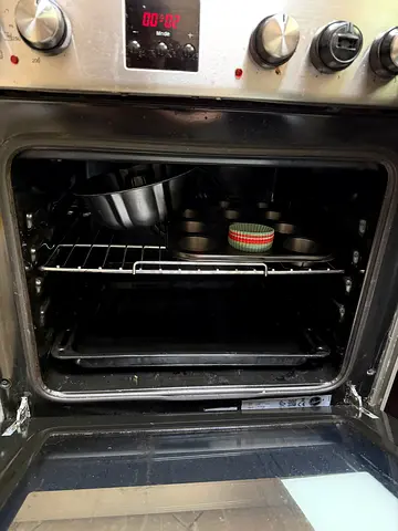 Used built-in electric oven with racks and trays