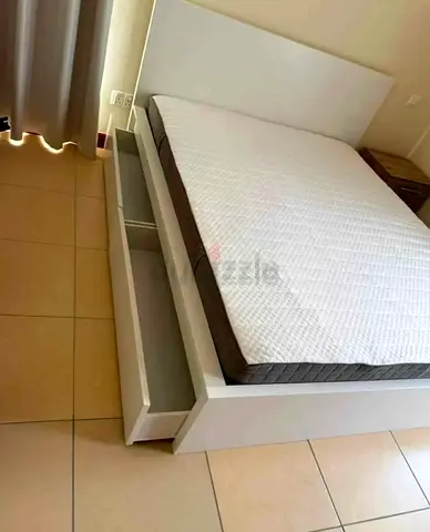 Ikea king size bed with mattress and storage drawers