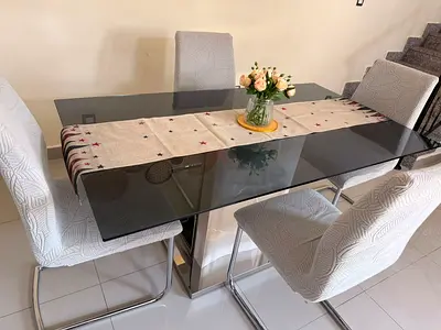 Glass Top Dining Table with 4 Upholstered Chairs - Good Condition