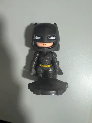 Batman collectible figure on display stand