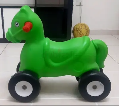 Green Ride-On Pony Toy on Wheels - Good Condition