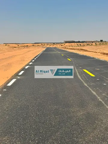 Land for sale in Al-Hawshi, with a permit to build a villa (ground floor + first floor).