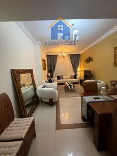 Two-bedroom apartment with parking for sale in Al-Taawun.