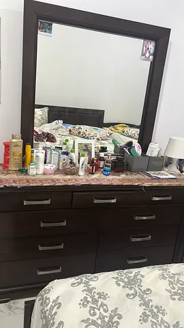 Dark wood dresser with large mirror - good condition