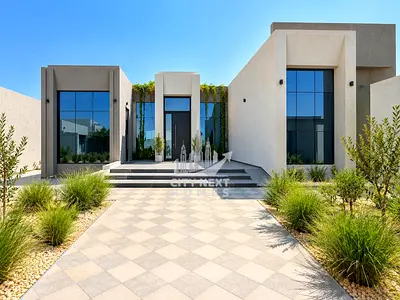 Exclusive 4BR Villa with Garden & Covered Parking