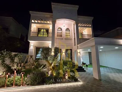 Luxury villa for sale in Al Rawda 2 – Ajman. Spacious area. Includes electricity, water, and air conditioning. Freehold ownership.