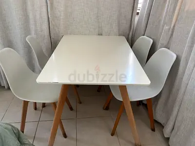 White color 4 chair dinning table