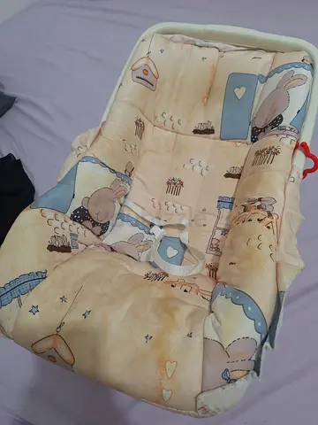 Used padded baby bassinet mattress/insert with cute print