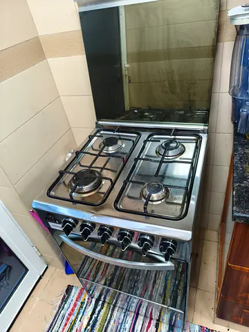 Freestanding 4-Burner Gas Stove with Oven - Good Used Condition