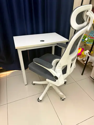 White study desk with ergonomic swivel chair — good condition