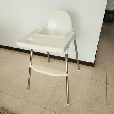 Simple white baby high chair with tray and footrest - good condition