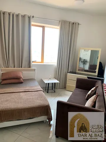 For sale at an excellent price with easy payment installments: a third-floor apartment in Ajman (Al-Aliya area) featuring two bedrooms and a living ro