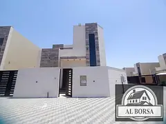 For sale: Corner villa in Al Helio 2, Ajman, consisting of 4 master bedrooms, a majlis, a living roo
