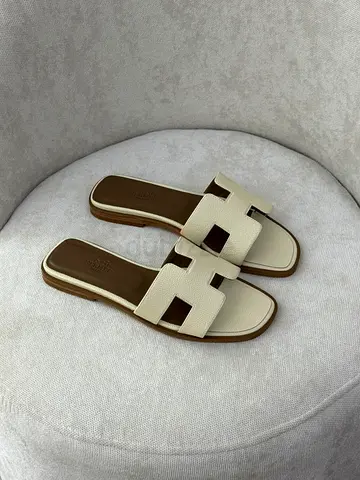 Cream leather slide sandals, size not marked (women's)