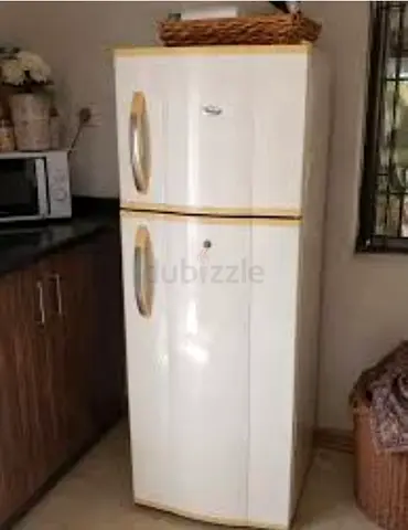Medium Whirlpool double-door fridge in good working condition