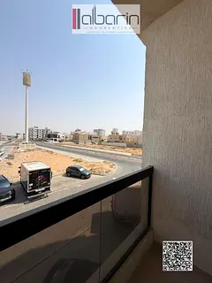 One-bedroom apartment with a living room for rent in Al-Aliya – AED 34,000 per year.
