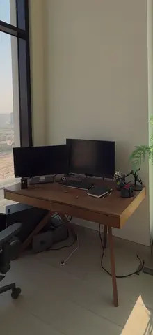 Dual-monitor desktop setup with desk, and peripherals — ready to use