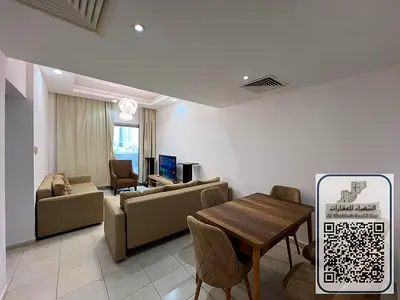 Fully furnished two-bedroom apartment with a front-facing view, available for annual rent.