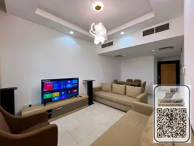 Fully furnished two-bedroom apartment with a front-facing view, available for annual rent.