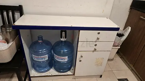 Used small kitchen/storage cabinet with drawers and open shelf (fits water jugs)