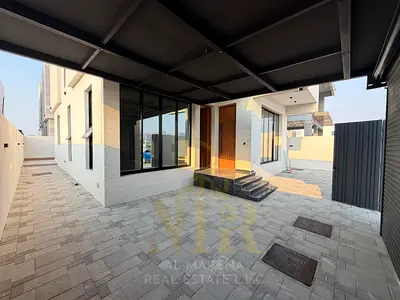 **Luxury Villa for Sale in Al Bahia – Ajman | Two Floors + Roof with Modern Design | 5 Master Bedrooms & High-End Finishes | An ideal space for a life