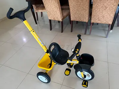 Yellow Kids Tricycle with Push Handle and Storage Basket - Good Condition