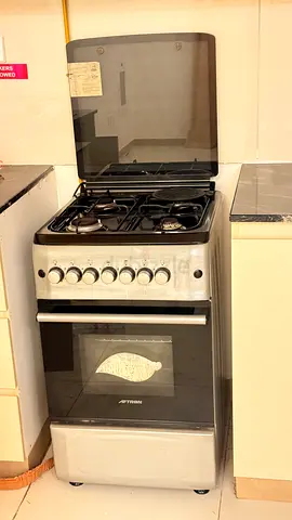 Freestanding 4-Burner Gas Stove with Oven - Good Working Condition