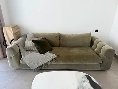 Three-seater upholstered sofa in olive green - good condition