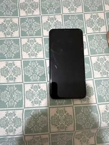 iPhone with cracked on screen protector - used, (locked off)