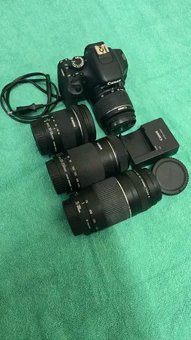 Canon DSLR with 4 Lenses (18-55mm, 75-300mm, 55-250mm 10 -18mm) and Charger with Bag