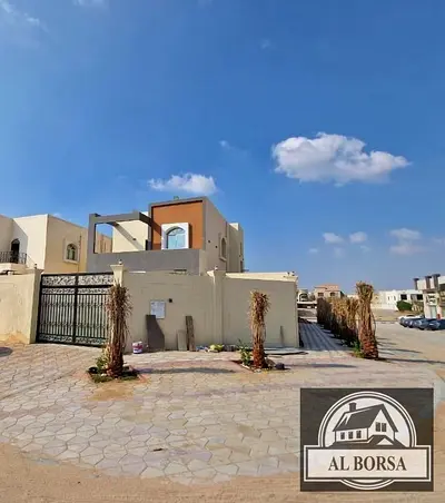 Luxury villa for sale on a corner lot, directly from the owner, price includes electricity, water, and air conditioning.