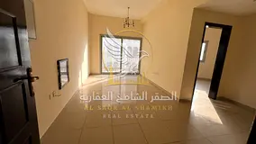 1 Bedroom Apartment for Rent in Al Butina Sharjah with Balcony Central AC Gas and Family Building