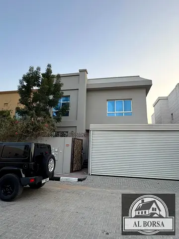 For rent in Al Zameela, Ajman: a villa with 5 master bedrooms, a majlis, a living room, a kitchen, and a maid's room.