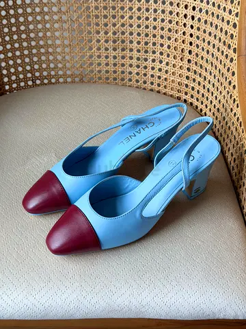 Light blue Chanel slingback pumps with burgundy cap toe, size unknown