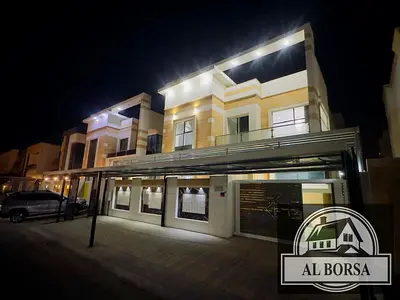 For rent in Al Yasmin: a villa with 5 bedrooms, a majlis, 2 living rooms, a kitchen, and a maid's room.