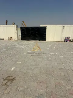 Prime 9,000 Sq. Ft. Interlocked Open Yard with Office & 75 kVA Power | Al Saja'a Industrial Area